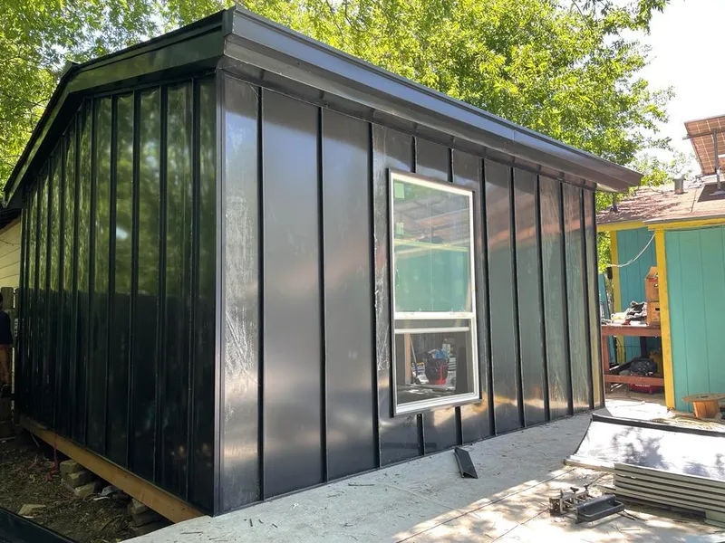 Black standing seam metal wall panels for Roof Inspection in Hermon