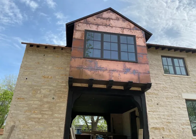 Copper metal panel facade on a stone building for Metal Roof Coating in Hermon
