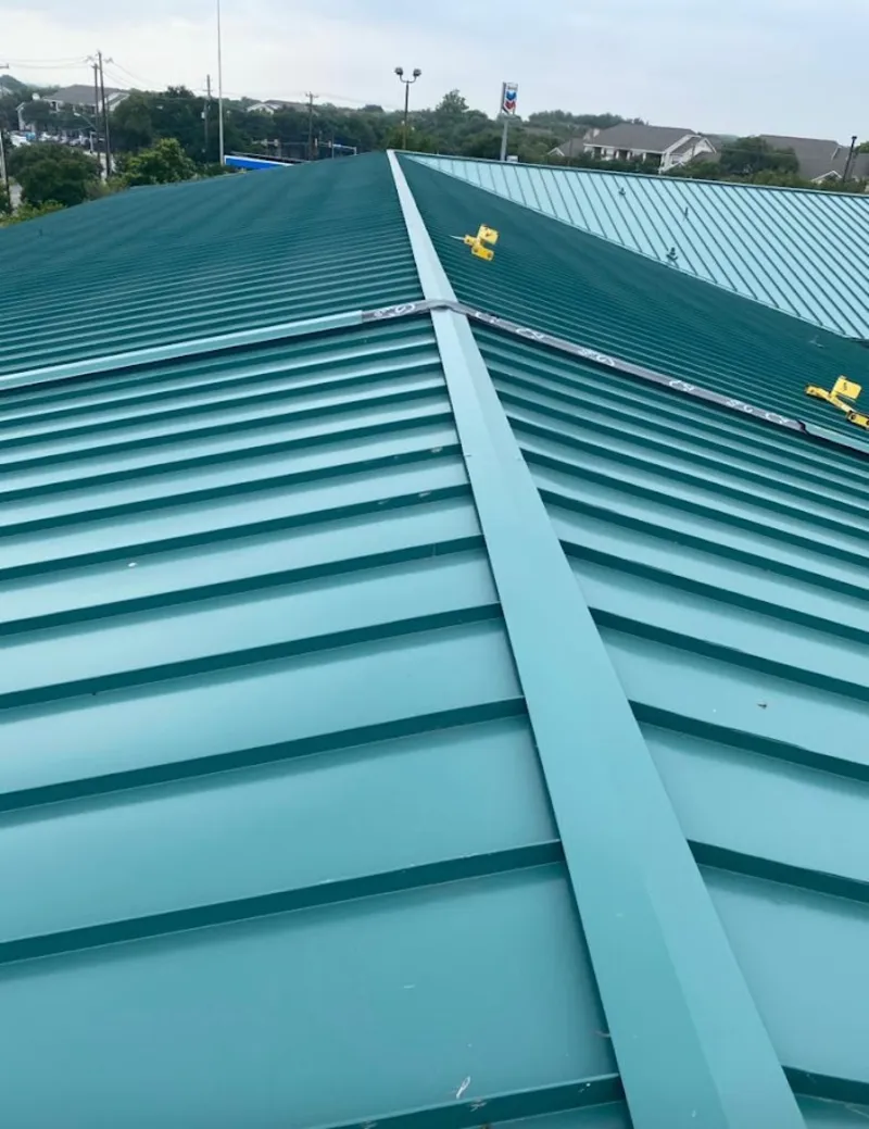 Green commercial metal roof ridge and valley for Metal Roof Repair in Hermon