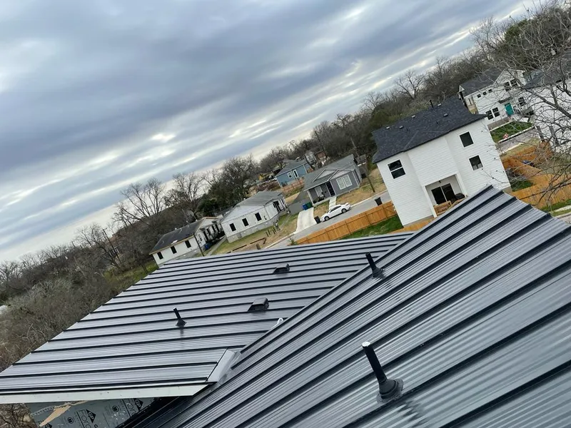 Standing seam metal roof panels with vents for Skylight Repair in Hermon